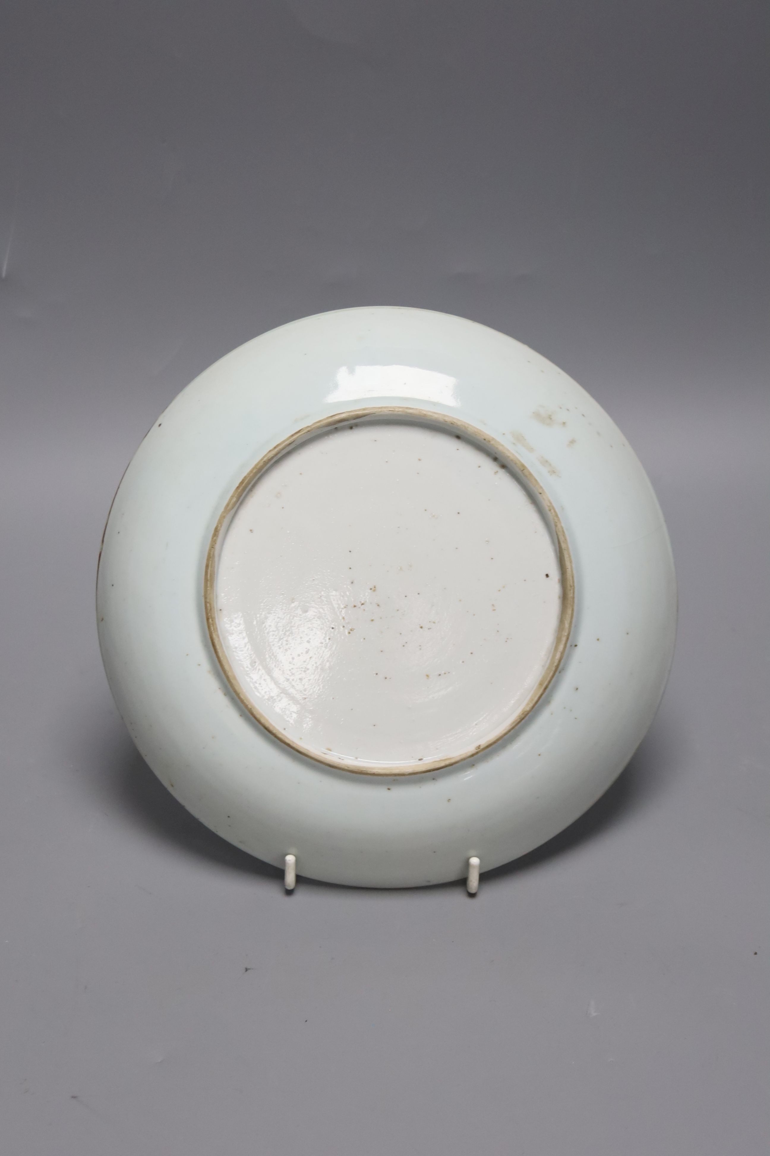 An 18th century Chinese shallow circular blue and white dish with incised decoration, Dia 22cm